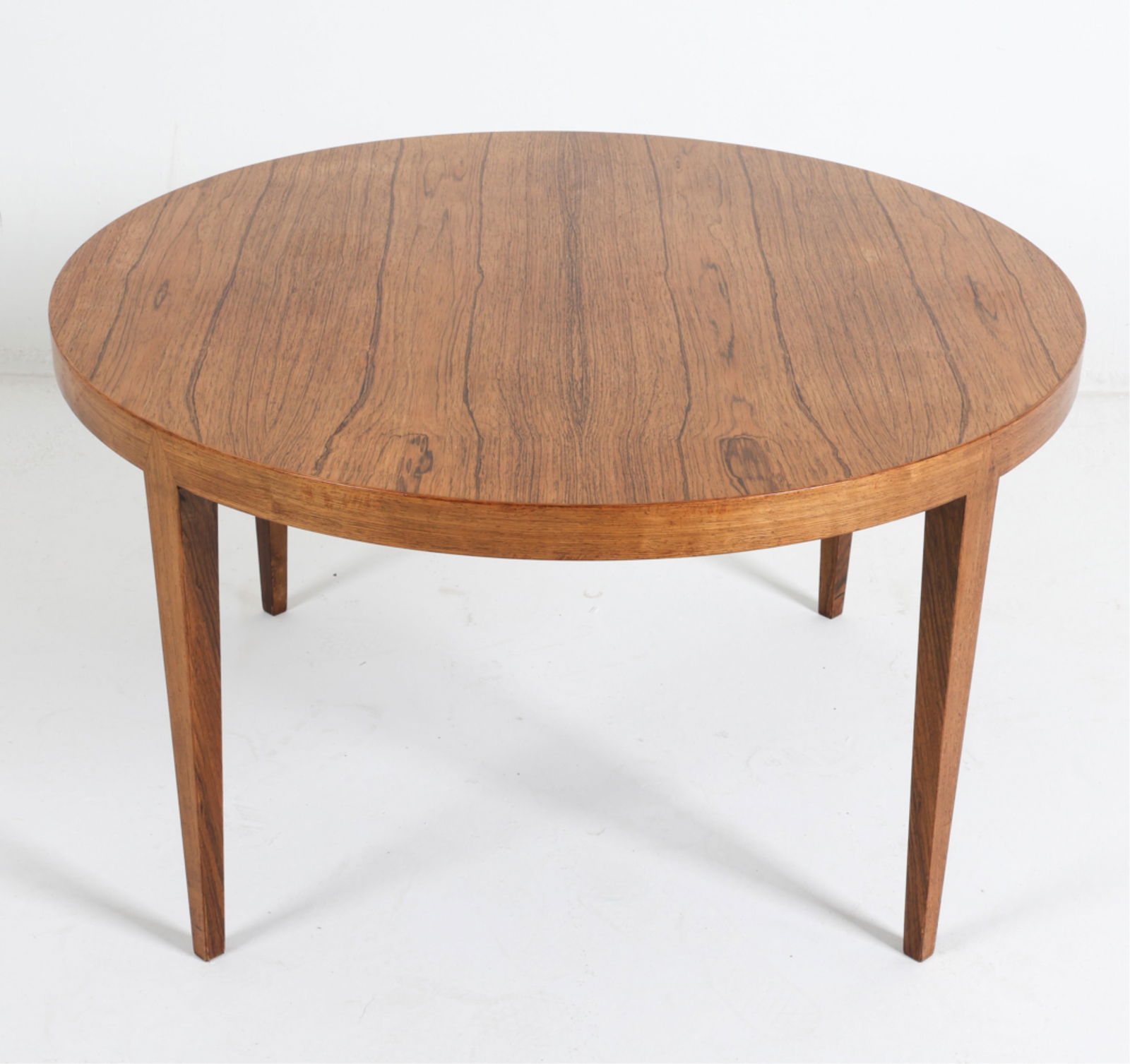 ATTR. SEVERIN HANSEN DANISH ROSEWOOD COFFEE TABLE: For Haslev mobelsnedkeri. Apparently unsigned. Circa 1960's. Dimensions: H 20" x Dia 35.5" Condition: Slight water marks and scuffs to surface. Wear consistent with age and use. DMK066