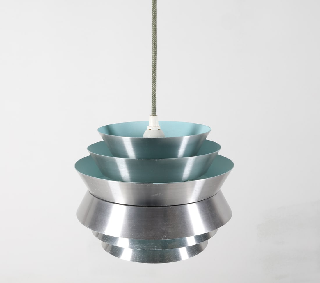 CARL THORE 'TRAVA' SILVER PENDANT LIGHT, C. 1970'S: For Granhaga. Silver finished aluminum with blue inside. Sweden. Dimensions: H 7" x Dia. 10". Condition: Wiring untested. Few scuffs to finish. Wear consistent with age and use.