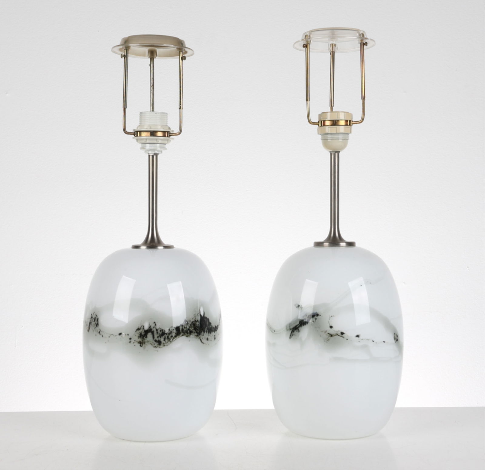 MICHAEL BANG HOLMEGAARD 'SAKURA' LAMPS, C.1970'S: Designed by Michael Bang. Denmark. White milk glass with grey decoration. Dimensions: H 21.5" x Dia. 7.5". Condition: Wiring untested, European plugs. Few scuffs and light surface scratches. No shades