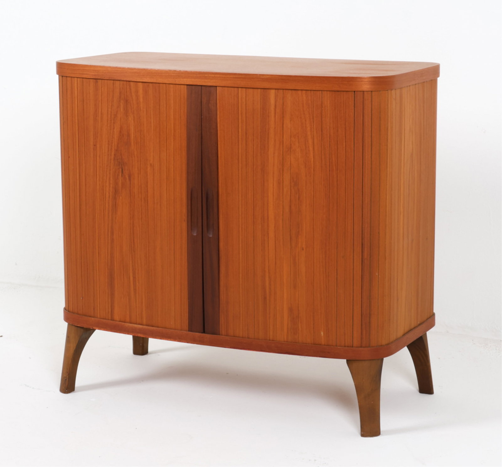 MID-CENTURY DANISH TEAK TAMBOUR CABINET, C.1960'S: Adjustable pine shelves. Dimensions: H 27.25" x W 29.25" x D 14.75". Condition: Minor chips to veneer on back top and lower edge. Wear consistent with age and use. B038