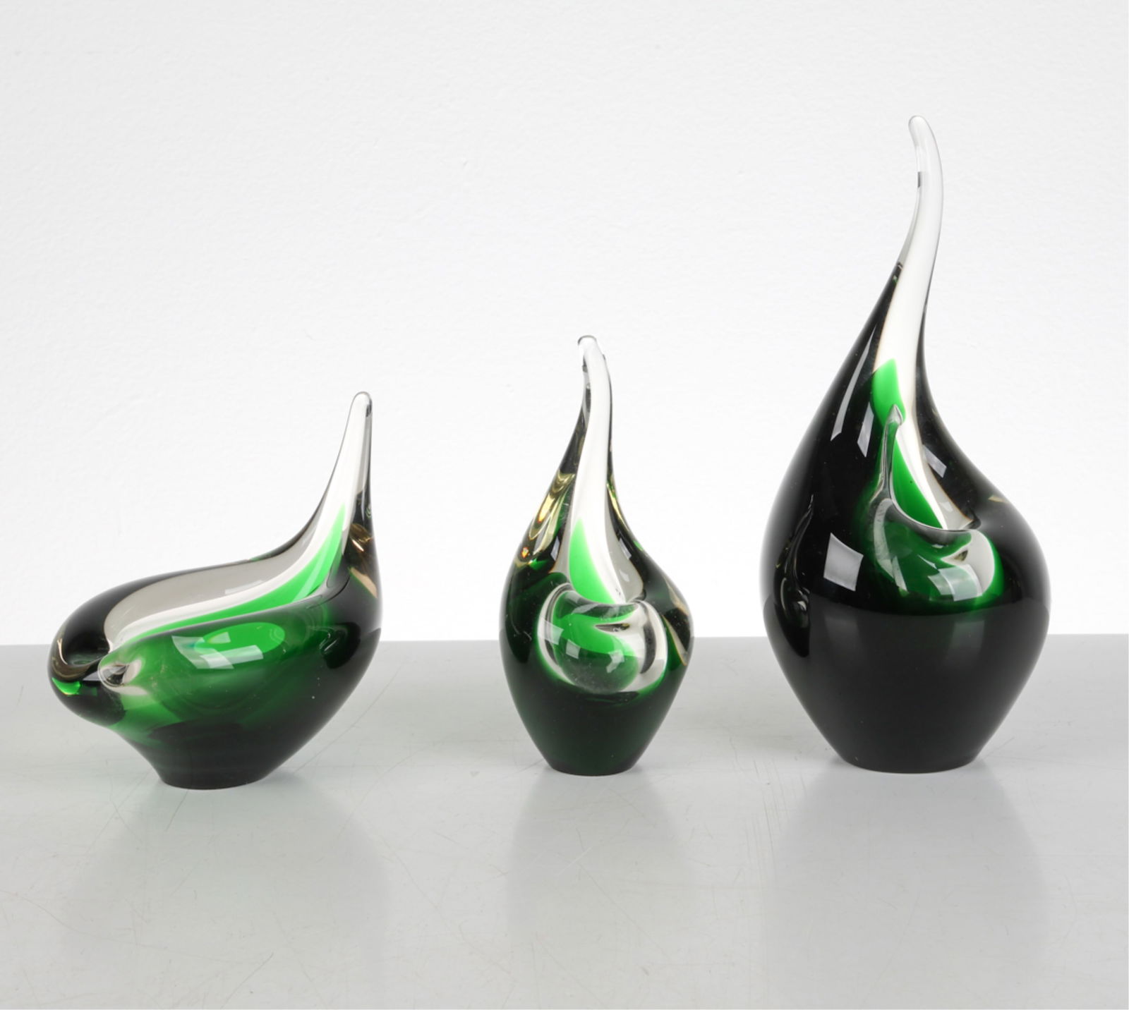 (3) PER LUTKEN 'FLAMINGO' ART GLASS VASES C.1960'S: Orchid glass green vases. For Holmegaard. Signed underneath. Denmark. Dimensions: Tallest H 9.25". Condition: Few light scuffs, good presentation overall.