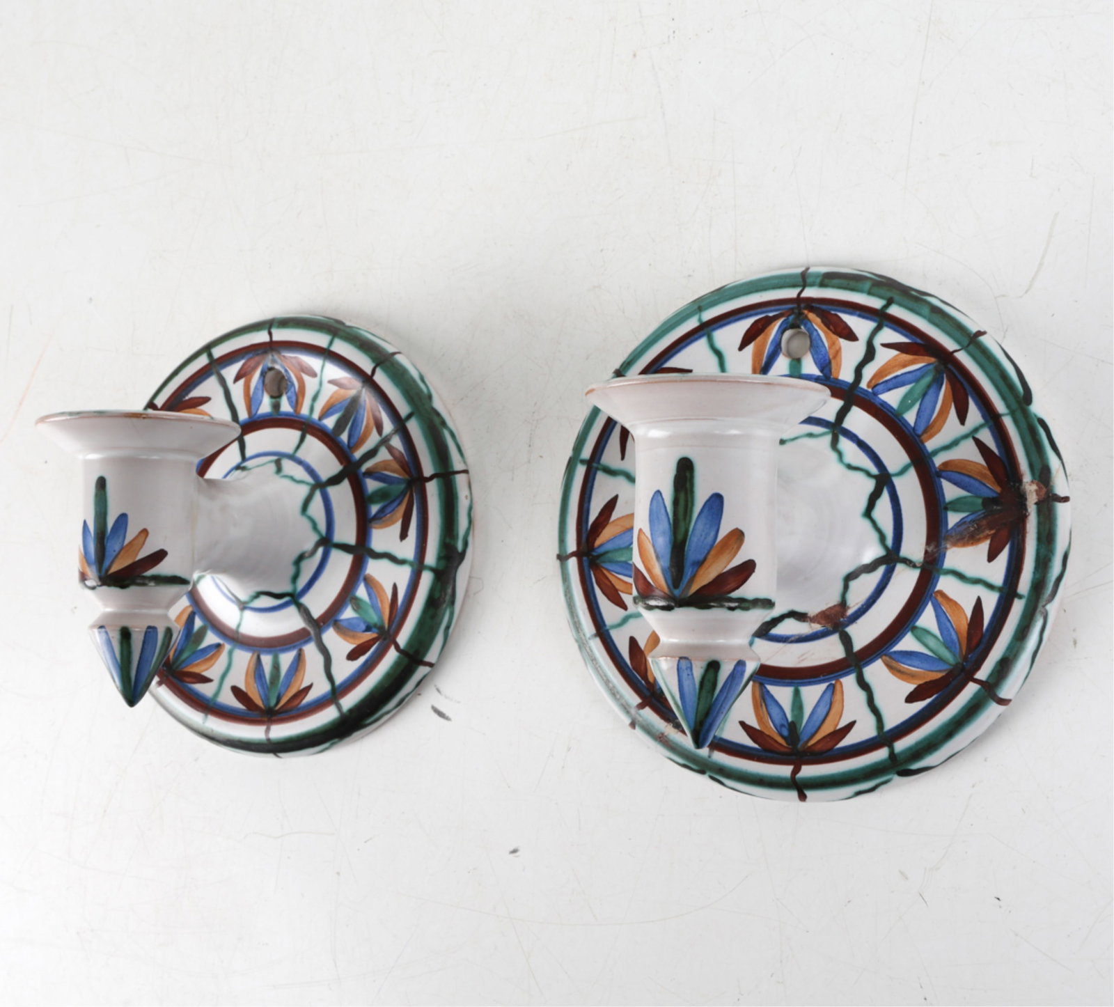 E.B.S. KLINT DANISH CERAMIC SCONCES: Signed on back. Mid 20th century. Dimensions: Dia. 6.5" x D 4.5". Condition: Previous repair to one. Wear consistent with age and use.