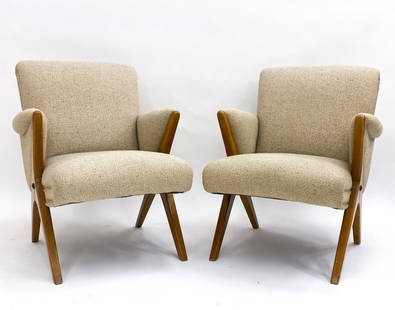 DUTCH THEO RUTH PENGUIN STYLE LOUNGE CHAIRS: Circa 1950's Tweed upholstery with teak legs and arm rest accents. Brass tacks to sides. Dimensions: H 31" x W 26.5" x D 31.5" Seat height 18" Condition: Minor scuffs and marks to legs. Slight pilling