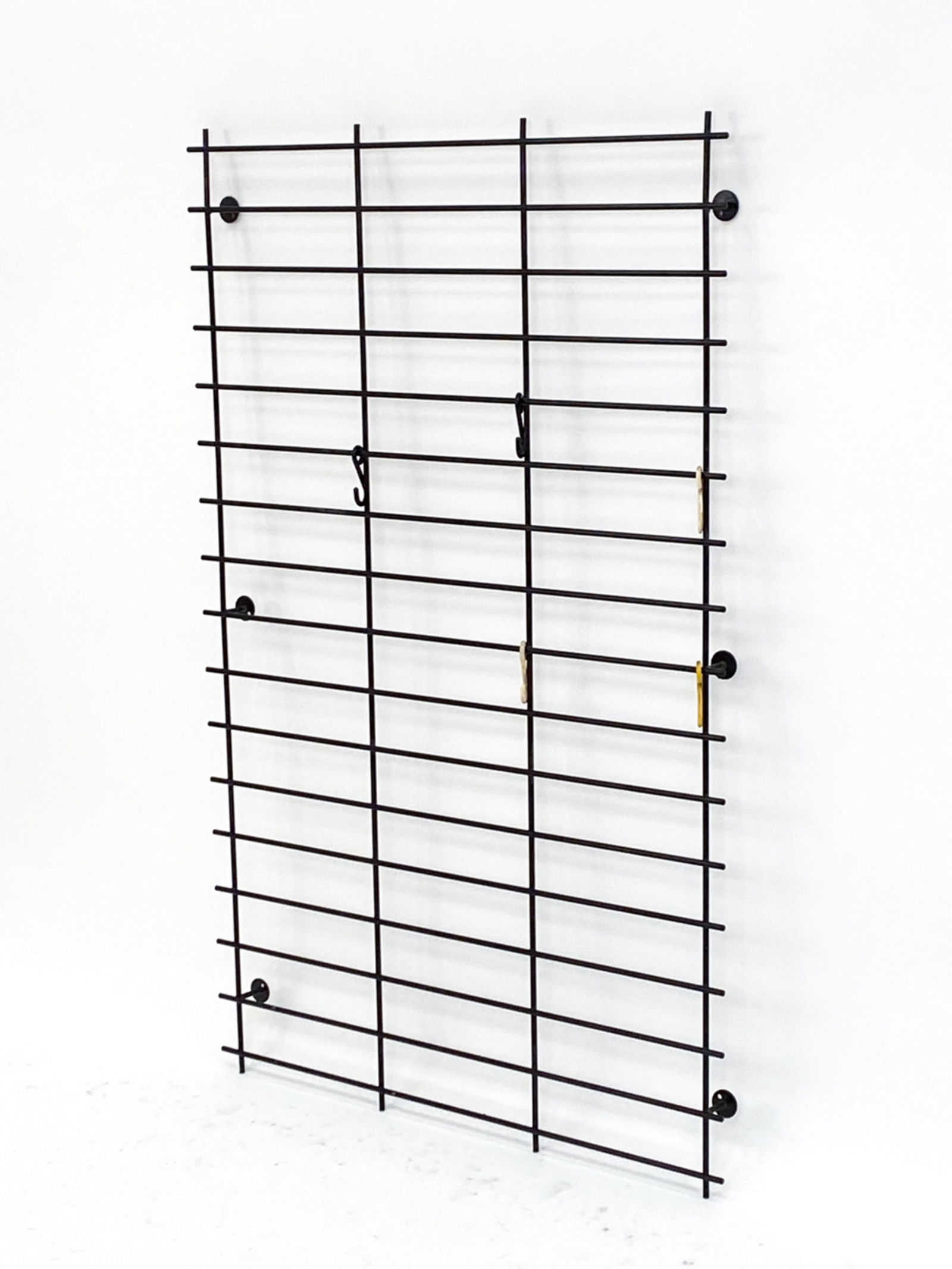 KARL FICHTEL METAL WIRE GRID COAT RACK C.1960'S: For Drahtwerke Erlau. Unmarked Dimensions: H 32" x W 49.75" x D 2.25" Condition: Scuffs and marks to painted metal. PJ220