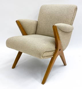 THEO RUTH PENGUIN STYLE DUTCH LOUNGE CHAIR C.1950S: Tweed upholstery with teak legs and arm rest accents. Brass tacks to sides. Dimensions: H 31" x W 26.5" x D 31.5" Seat height 18" Condition: Minor scuffs and marks to legs. Slight pilling to upholster