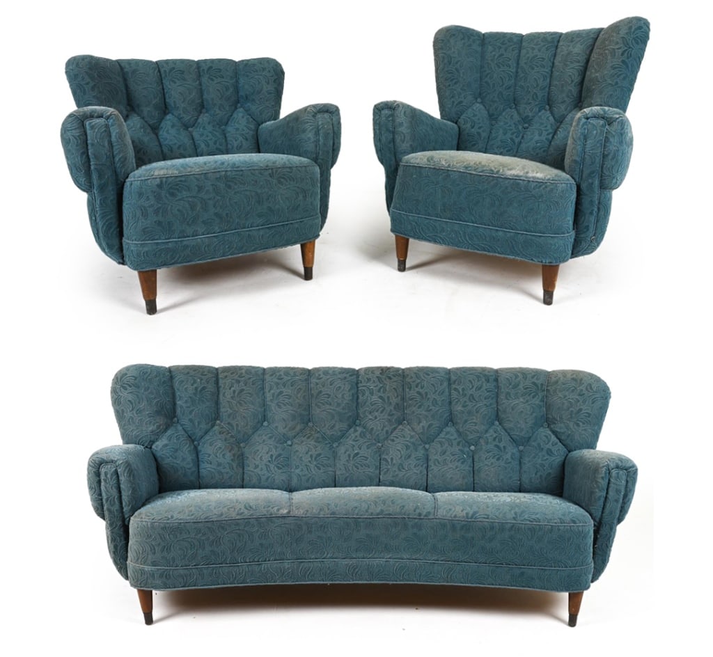 DANISH SOFA SUITE IN THE STYLE OF FLEMMING LASSEN: Journey into a world where design meets dream with this captivating Danish Mid-Century Sofa and matching pair of chairs, channeling the evocative style of the legendary Flemming Lassen. A relic from t