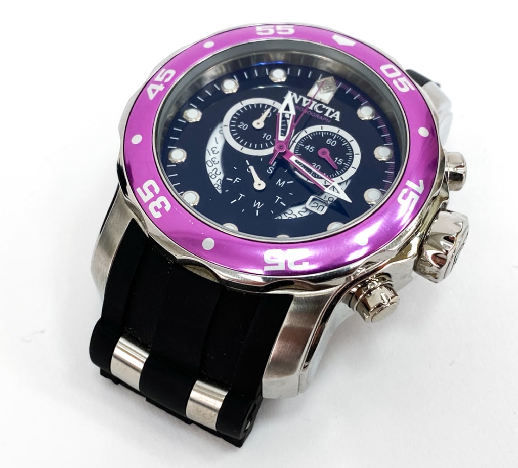 INVICTA PRO DIVER CHRONOGRAPH MENS WATCH: Featuring a 48mm stainless steel case with a Swiss quartz movement. Model number 19649. Marked on face and on backside. Includes instructions manual and Invicta case for watch. Dimensions: (Band) L 7.