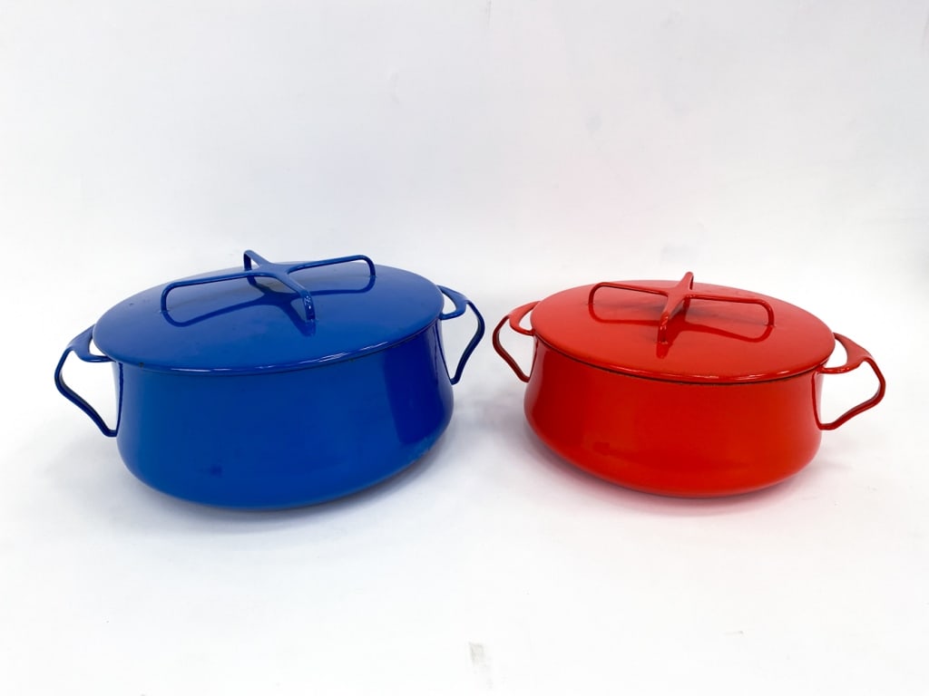 (2) VINTAGE DANSK KOBENSTYLE CASSEROLES: Two Vintage Dansk Kobenstyle enamelware casseroles designed by Jens Harald Quistgaard in 1956. Design feature: lid doubles as a trivet. Both marked under, Dansk Designs France JHQ. Dimensions: (Larges
