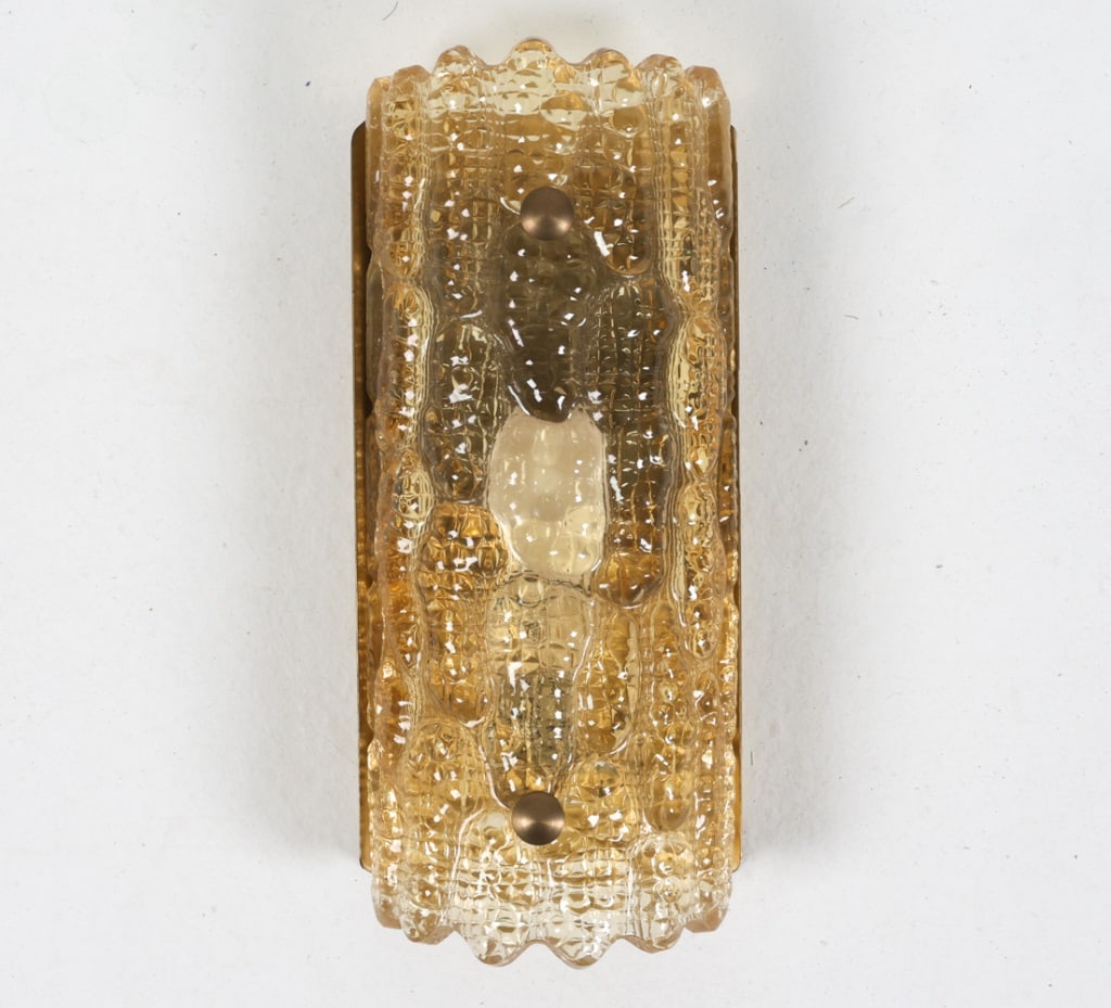 CARL FAGERLUND FOR ORREFORS SCONCE C.1970'S: For Lyfa and Orrefors. Brass backing plate. Sweden. Dimensions: H 11.25" x W 5" x D 3". Condition: Wiring untested, requires rewiring. Few scuffs and dings to brass. Wear consistent with age and use.