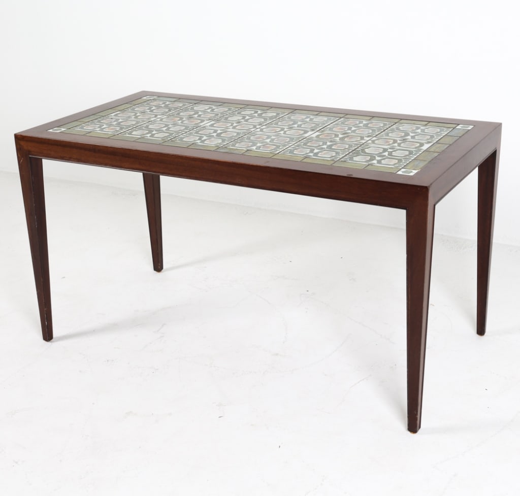 SEVERIN HANSEN HASLEV ROSEWOOD & TILE COFFEE TABLE: Ceramic mosaic tiles on top. Signed Royal Copenhagen on tiles and underneath. Circa 1960's. Dimensions: H 24" x W 44" x D 23". Condition: Few rubs and dings to wood. Wear consistent with age and use.