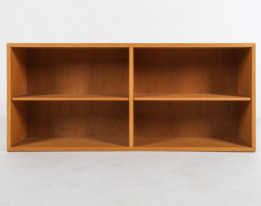 KARL ANDERSSON & SON OAK BOOKCASE C.1960'S: Label on top back corner. Adjustable shelves. Sweden. Dimensions: H 23.25" x W 53" x D 10.25". Condition: Slight blemish to tops. minor nicks and marks consistent with age and use.