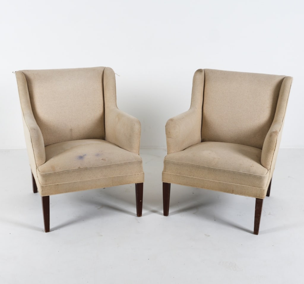 FRITS HENNINGSEN DANISH LOUNGE CHAIRS C.1950: Cream fabric upholstery. Beech legs. Denmark. Dimensions: H 31.75" x W 25.5" x D 26" x SH 17". Condition: Moderate blemishes to upholstery. Cleaning or reupholstering recommended. Marks and scuffs to