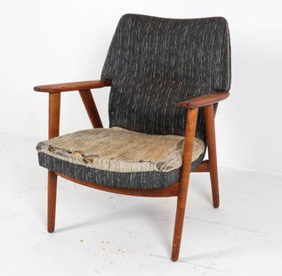 KURT OLSEN FOR SLAGELSE MODEL 230, CIRCA 1960'S: With fabric upholstery. Danish teak lounge chair.Dimensions: H 33.5" x W 27.5" x D 24" x SH 15".Condition: degradation of cushion stuffing, tears to fabric - reupholstering recommended. Wear consisten
