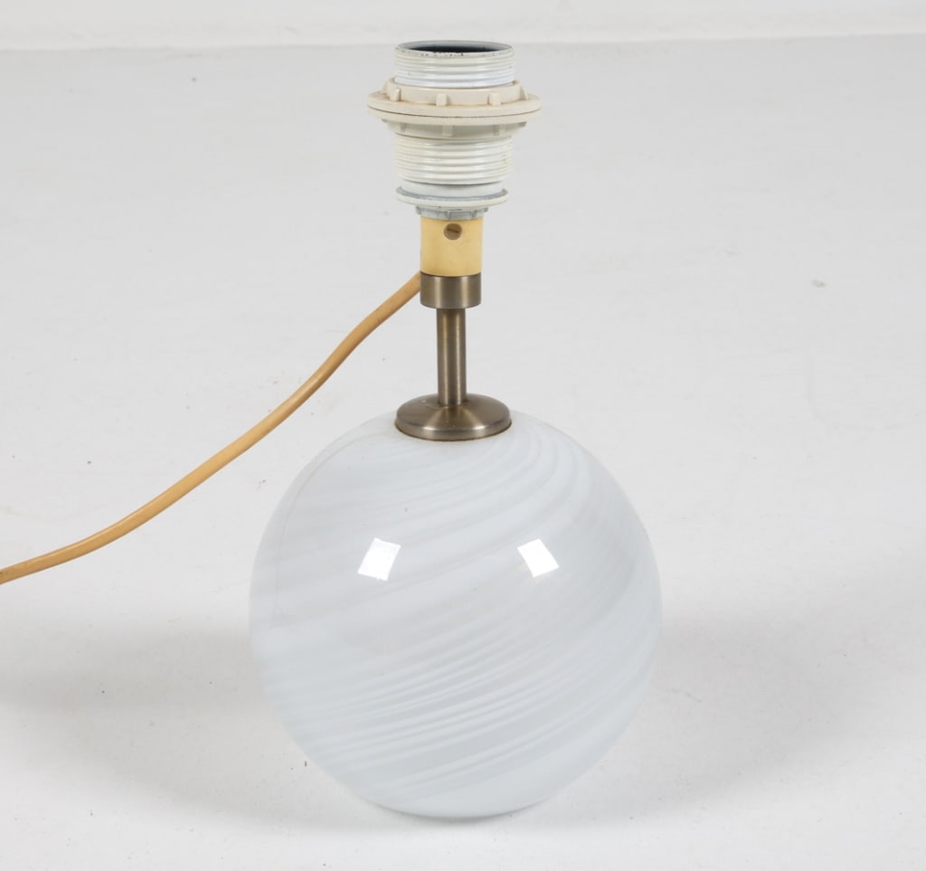 HOLMEGAARD 'MISTY' GLASS TABLE LAMP C.1980'S: Designed by Torben Jorgensen. Round glass ball table lamp. Denmark, Circa 1980's. Dimensions: H 10.75" x Dia. 5.25". Condition: Wiring untested. European plug, Wear consistent with age and use.