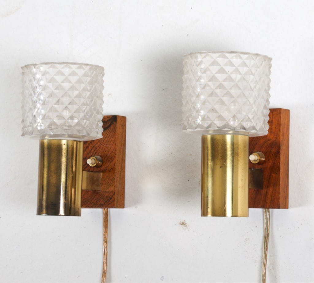 PAIR OF DANISH ROSEWOOD & GLASS SCONCES: With brass. Denmark, circa 1960's. Dimensions: H 6" x W 5.25" x D 3.5". Condition: Cords cut on one,European plug on other - requires adapter or rewiring for use in the US. Wiring untested. Scuffs and