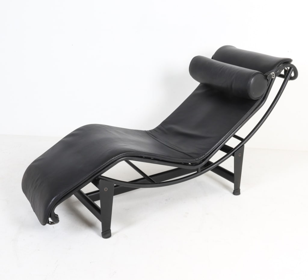 CASSINA STYLE CHAISE LOUNGE CHAIR: No apparent marks. Adjustable on frame. With black leather cushion and pillow. Dimensions: H 31.75" x W 65" x D 20". Condition: Minor marks and scratches to frame. Wear consistent with age and use. Pr