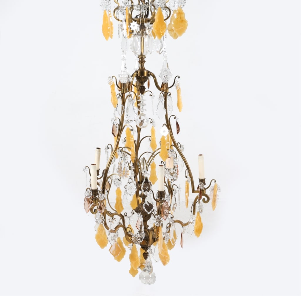 BACCARAT CHANDELIER: Multi-tiered brass chandelier with several crystal glass drops, bulbs, accents, with yellow drops. Early 20th century. Dimensions: H 67" x Dia. 29.5". Condition: Wiring untested. Some light scuffs and