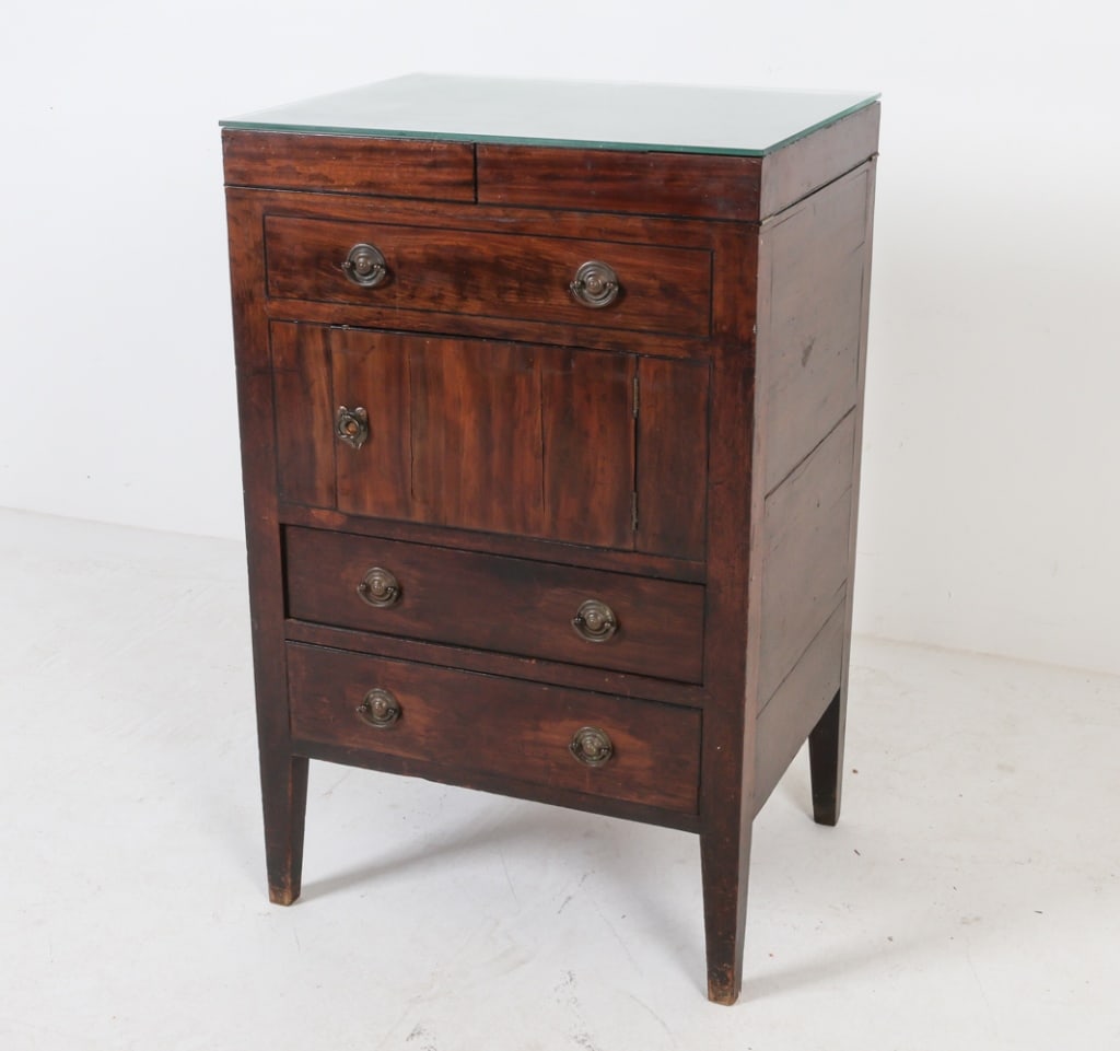 ENGLISH MAHOGANY WASH CABINET: Hinge top reveals wash basin. Iron hardware. Dimensions: H 35.75" x W 22.25" x D 17.5" Condition: No bowls included, Stress cracks to top surface. Scuffs, marks and nicks throughout. Wear consistent w
