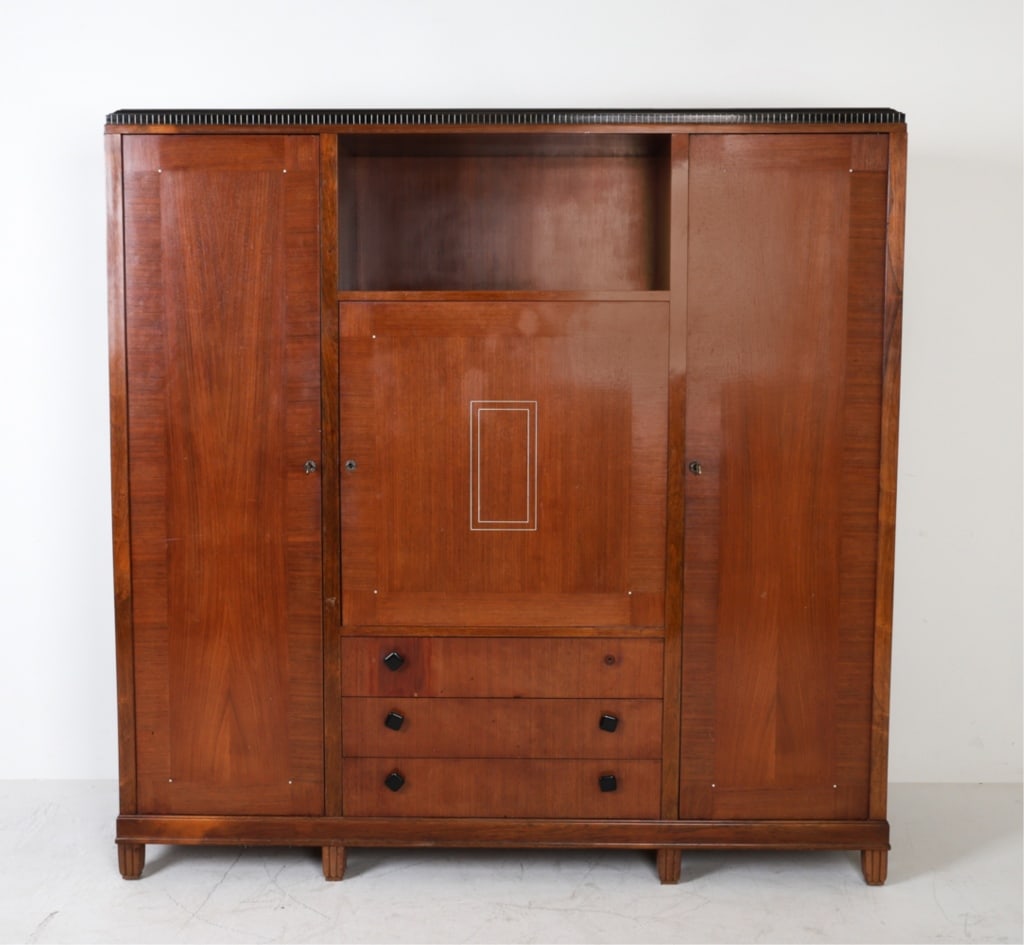 ART DECO TEAK & ROSEWOOD ARMOIRE DRESSER CABINET: Includes (3) keys. Two for exterior and one for interior. Inlaid bone top. Dimensions: H 70.75"x W 71" x D 18.75" Condition: Marks and scuffs. Loss to lower drawer pull. Rubbing and marks to surface. 