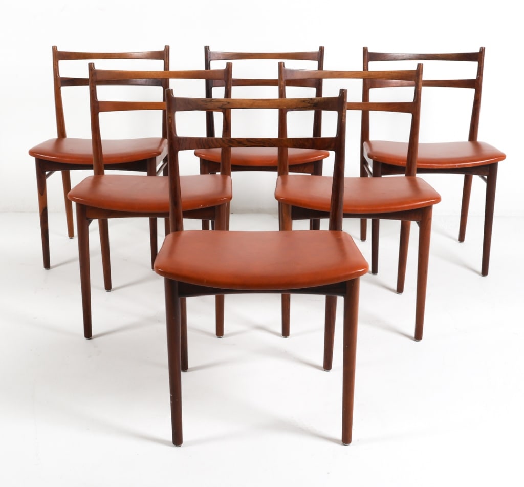 HENRY ROSENGREN HANSEN ROSEWOOD DINING CHAIRS: Set of six rosewood dining chairs designed by Henry Rosengren Hansen for Brande Mobelindustri. Marked under chairs.Dimensions: H 31" x W 18.25" x D 20" x SH 17.5"Condition: Normal wear consistent with