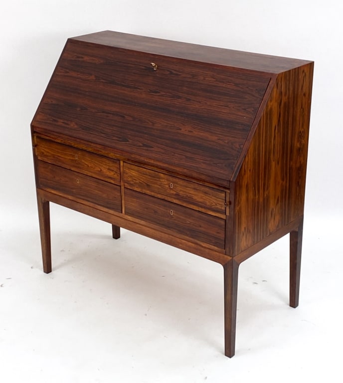 SEVERIN HANSEN FOR HASLEY ROSEWOOD SECRETARY DESK: Designed by Severin Hansen for production by Hasley Mobelfabrik. Circa 1960's. Dimensions: H 42" x W 43.25" x D 19.75" Condition: Some soiling/water marks to drawers. Light surface wear consistent wit