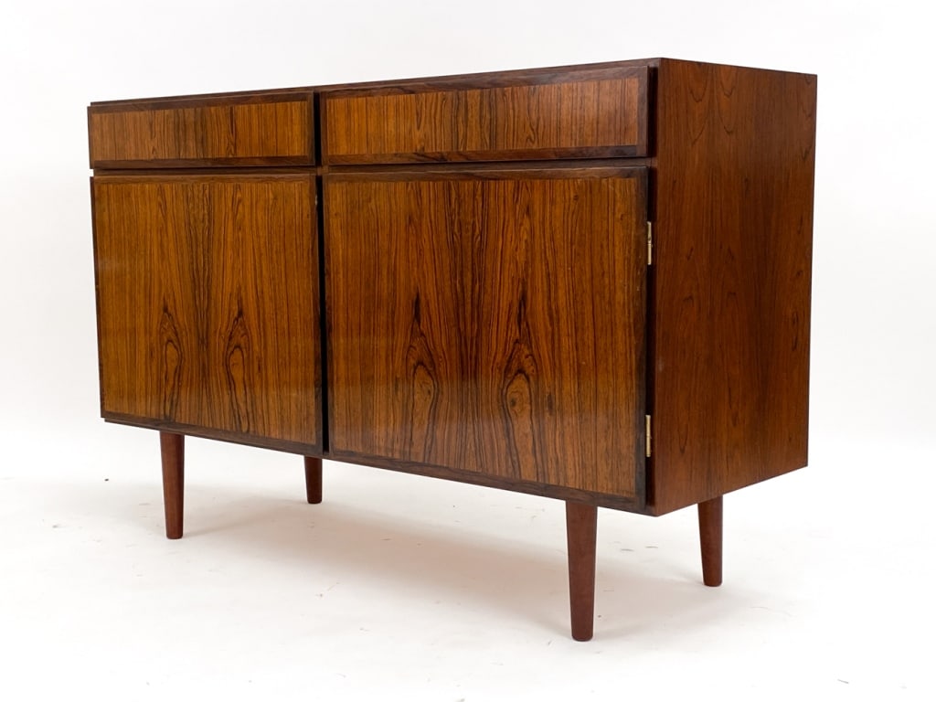 GUNNI OMANN FOR OMANN JUN ROSEWOOD CABINET: With Omann Jun label to interior with model number as No. 3. Circa 1960's. Dimensions: H 30.75" x W 47.25" x D 17" Condition: Couple light marks and scratches consistent with age and use. Rubs to edge