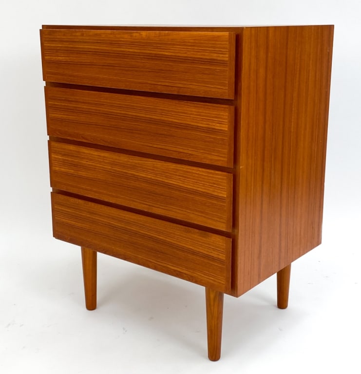 GUNNI OMANN FOR OMANN JUN MODEL NO. 60 TEAK CHEST: 4-Drawer teak chest of drawers designed by Gunni Omann for Omann Jun Mobelfabrik. Circa 1960's. Label on back with model number.Dimensions: H 30.75" x W 24" x D 17"Condition: Light surface wear consis
