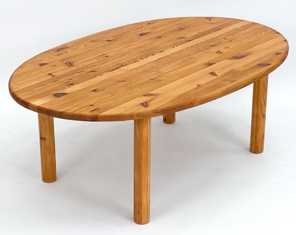 ATTR. RAINER DAUMILLER FOR HIRTSHALS COFFEE TABLE: Danish pine coffee table attributed to Rainer Daumiller for Hirtshals Sawaerk. Circa 1970's. Dimensions: H 20" x W 55" x D 35.5" Condition: Couple water marks to underside. Very light surface wear inc