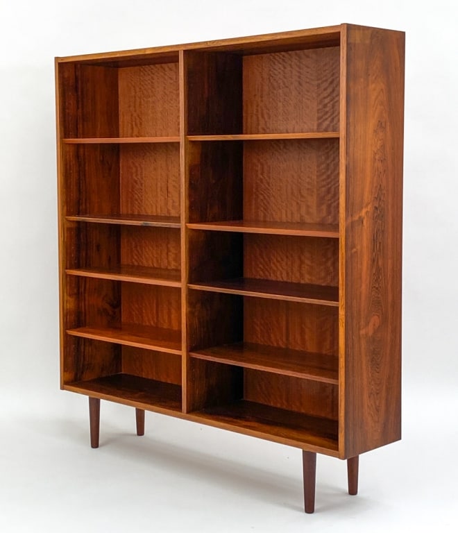 POUL HUNDEVAD FOR HU MOBLER ROSEWOOD BOOKCASE: With HU Mobler and Danish furniture stamp on back panel. Designed by Poul Hundevad for HU Mobler. Circa 1960's. Dimensions: H 58.75" x W 54.25" x D 12" Condition: Light surface wear including spots of