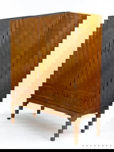 MID-CENTURY DANISH MAHOGANY CABINET, CIRCA 1940'S: Danish silverware cabinet with many trays and two bottom drawers. In the style of Kaare Kilnt and Ole Wanscher. Includes (2) keys. Unsigned. Dimensions: H 55" x W 47" x D 17.25" Condition: Bottom left