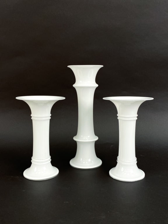 DANISH HOLMEGAARD GLASS, CIRCA 1970'S: Includes a pair of candlesticks and one vase. One with remnants of label. Dimensions: (Vase) H 10.5" x Dia 3.5" Condition: No issues to note, couple handling marks. JE073