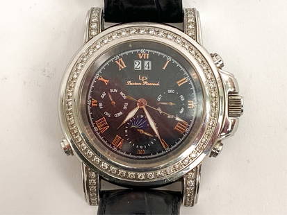 SWISS LUCIEN PICCARD DIAMOND BEZEL WATCH: Diamond halo in bezel setting stainless steel watch with leather band. Comes in original red leather Lucien Piccard box. Dimensions: L 10" Watch face Dia 2" Condition: Band clap requires repair. May r