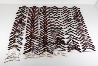 GROUPING OF WOODEN COAT HANGERS