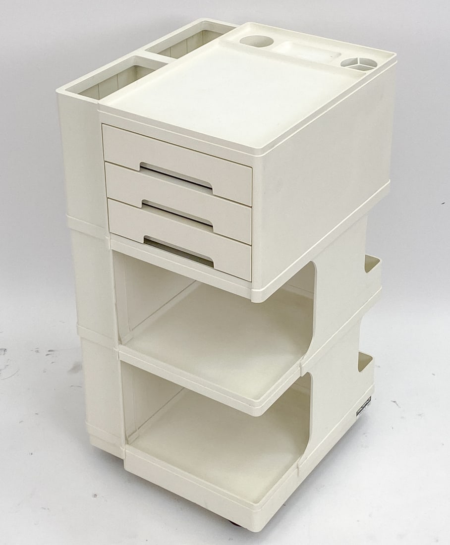 GIOVANNI PELIS TROLLEY FOR STILE NEOLT: Signed. Space age abs plastic artist's trolley. Italy, date on underside, 1983. MFG label on side. Dimensions: H 30.5" x W 16" x D 16" Condition: A few light surface marks consistent with age and norm