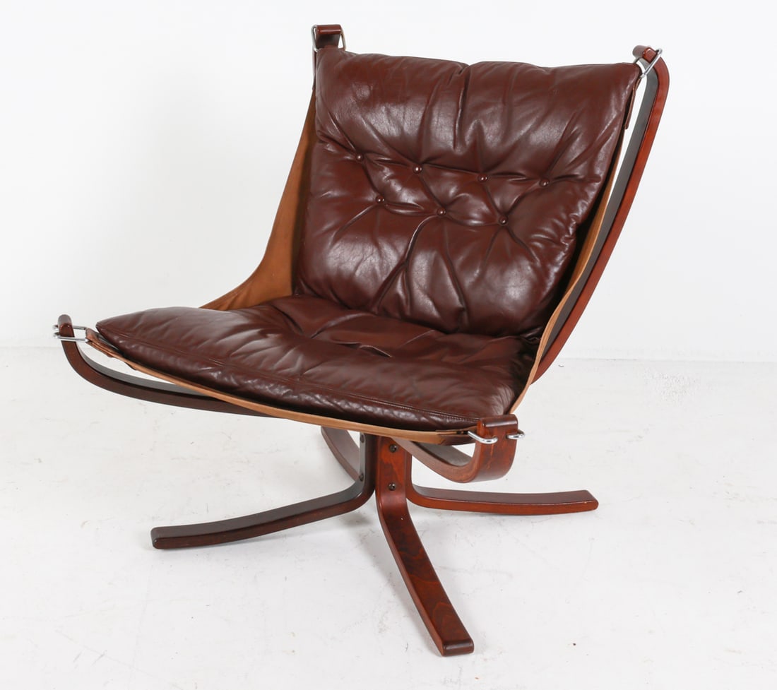 SIGURD RESSELL 'FALCON' BEECH & LEATHER CHAIR: Bentwood beech frame, canvas sling, with tufted leather cushion. Circa 1970's. Dimensions: H 32.75" x W 31" x D 29" x SH 17.5". Condition: Light wear consistent with age and use, Minor spots of discol