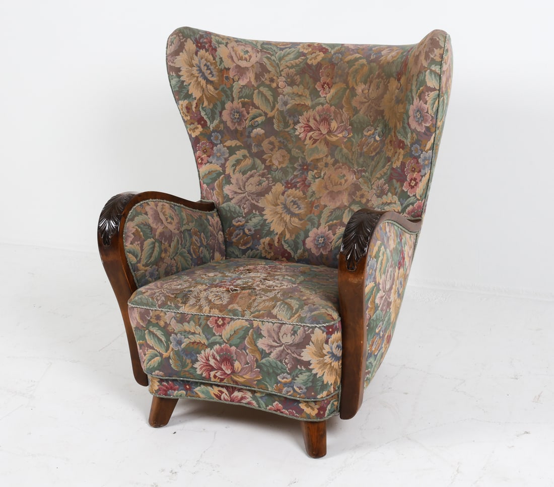 DANISH ART DECO WINGBACK LOUNGE CHAIR C. 1940'S: Carved birch wood arms with fabric upholstery. Tufted back. Dimensions: H 38.5" x W 31.75" x D 35" x SH 15". Condition: Some fraying to seat of chair, a few scattered rubs and dings to arms and legs, 