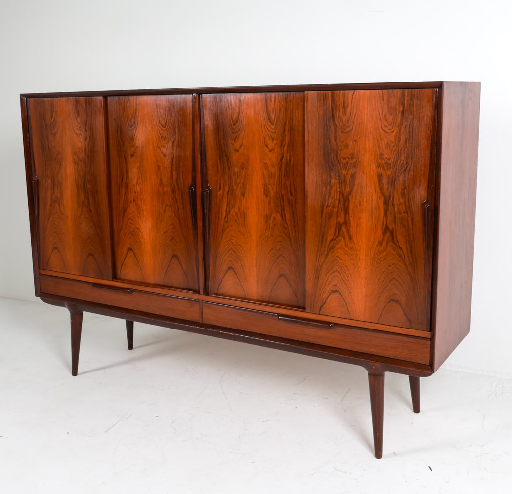 OMANN JUN MODEL 13 DANISH ROSEWOOD HIGHBOARD: Adjustable shelves. Sits freely on base. Stamped on back. Circa 1960's. Dimensions: H 49.5" x W 71" x D 18". Condition: Light scuffs and scratches on top, inside. Wear consistent with age and use. G04