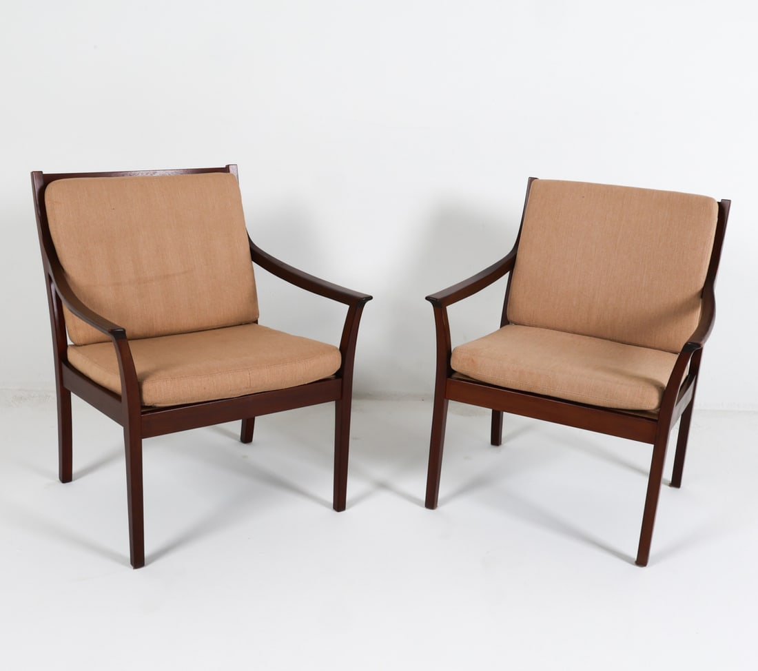 PAIR OF TORBJORN AFDAL MAHOGANY ARMCHAIRS C.1970S: For Bruksbo Mobelfabrik. Tagged underneath. Fabric cushions. Norway. Dimensions: H 32" x W 26.25" x D 21.5" x SH 17.25". Condition: Few light scuffs and rubs to wood. Wear consistent with age and use.