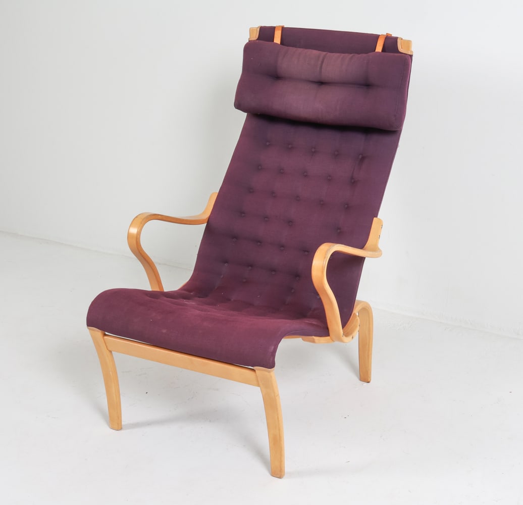BRUNO MATHSSON 'PERNILLA' BEECH LOUNGE CHAIR: With tufted fabric upholstery. Signed underneath. Sweden, circa 1980's. Dimensions: H 40" x W 22.75" x D 26" x SH 15.25". Condition: Minor surface soiling to fabric. Few scuffs and rubs to wood, mostl
