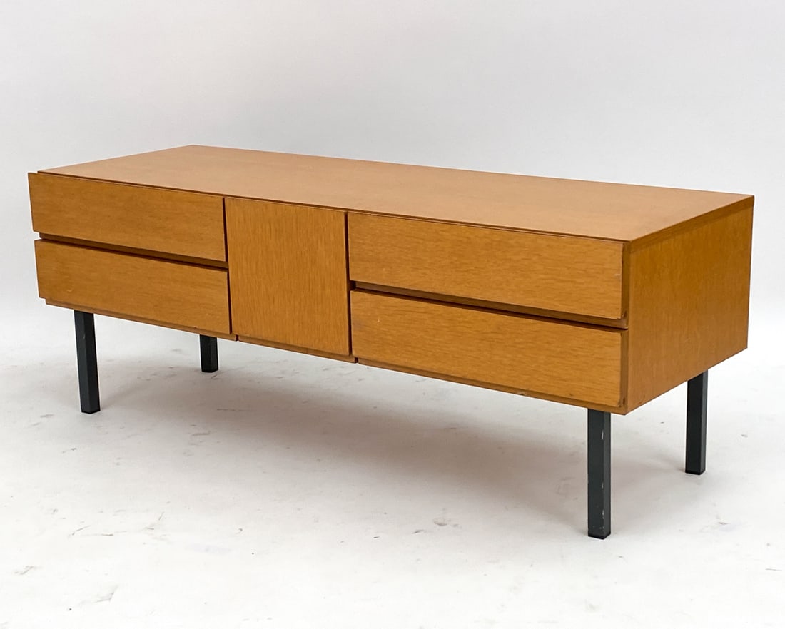 GERMAN TEAK LOW CHEST OF DRAWERS C. 1960'S: With metal legs. Unmarked. Dimensions: H 17.25" x W 46" x D 16" Condition: Very minor surface wear including couple marks consistent with age and use. PK125