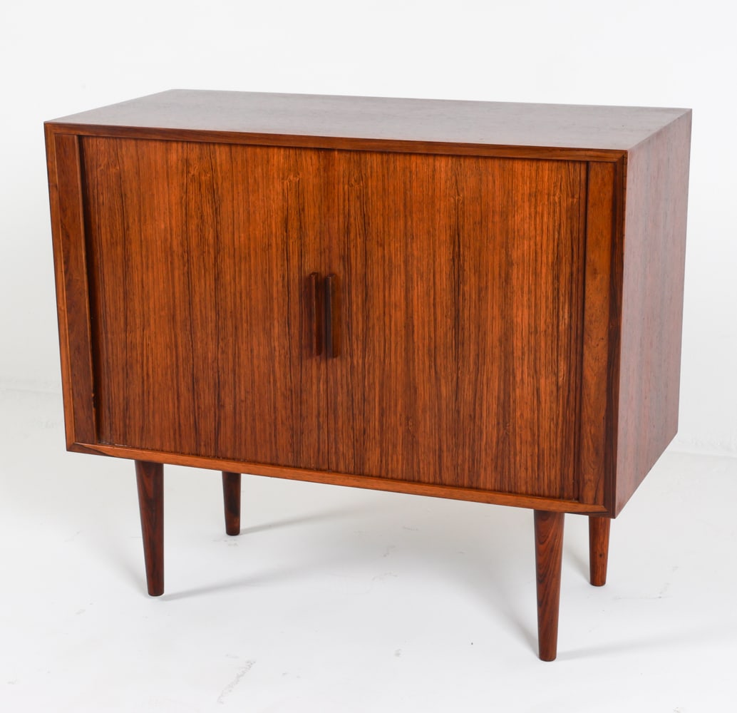 KAI KRISTIANSEN DANISH TEAK TAMBOUR CABINET: For FM. Circa 1970's. Dimensions: H 30" x W 34" x D 15.75". Condition: Some sun fading on top. Missing shelves. Wobbly. Wear consistent with age and use. C074
