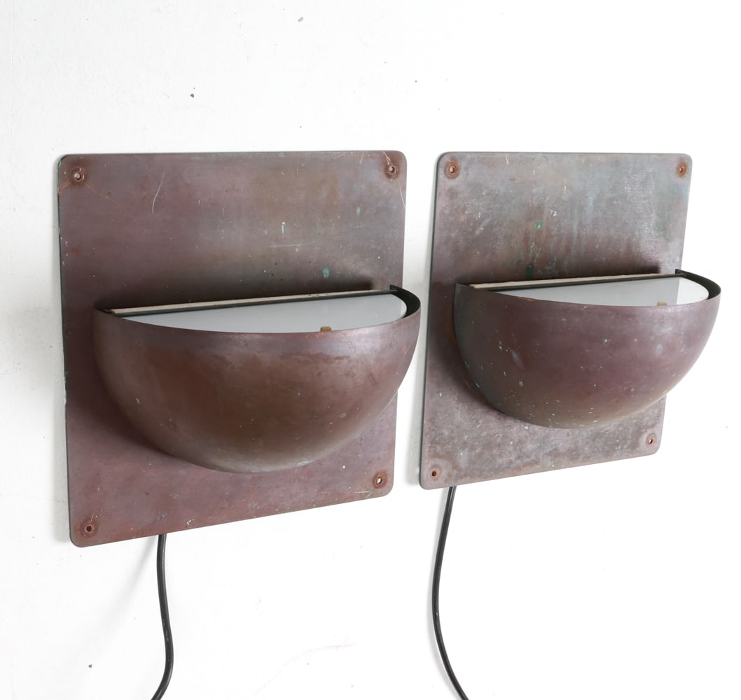 PAIR OF DANISH PATINATED COPPER SCONCES C. 1960'S: Dimensions: H 11.5" x W 11.5" x D 6" Condition: Moderate blemishes, marks and scratches to copper dome and paneling. Untested. Wear consistent with age and use.
