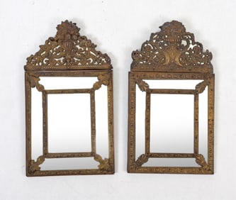 PAIR OF ANTIQUE ORNATE BRASS MIRRORS C. 19TH C.