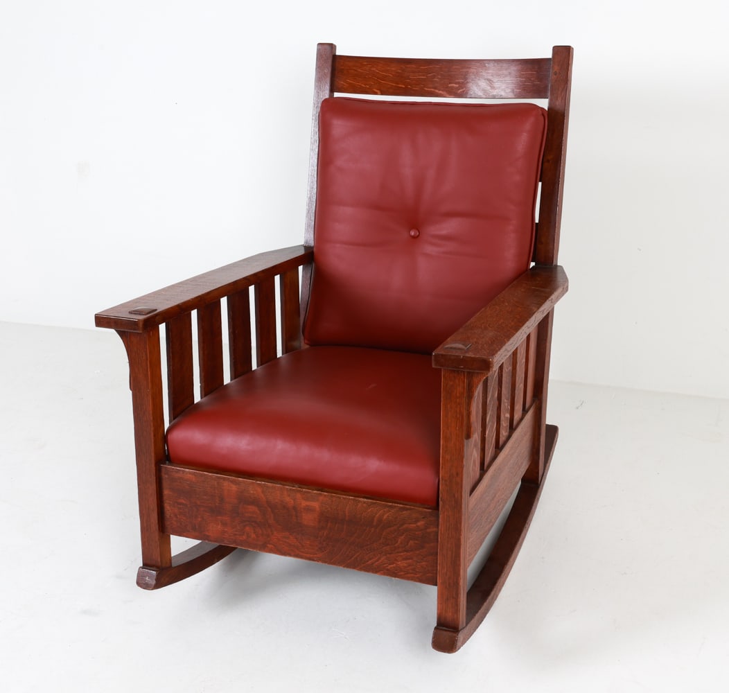 ARTS & CRAFTS MISSION OAK ROCKING CHAIR: Dimensions: H 40" x W 28.5" x D 34" x SH 15.25". Condition: Few scuffs, rubs, dings. Sun fading. Wear consistent with age and use.