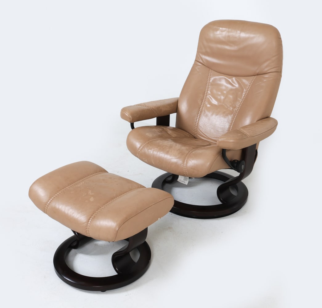 EKORNES STRESSLESS LEATHER LOUNGE CHAIR & OTTOMAN: Beech frames. Norway Dimensions: Chair H 39" x W 30.5" x D 26" x SH 16.25". Ottoman H 16" x W 21.5" x D 17.25". Condition: Some discoloration and rubs to leather, slight peeling on arms. Some surface 