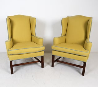 PAIR OF WING BACK ARMCHAIRS