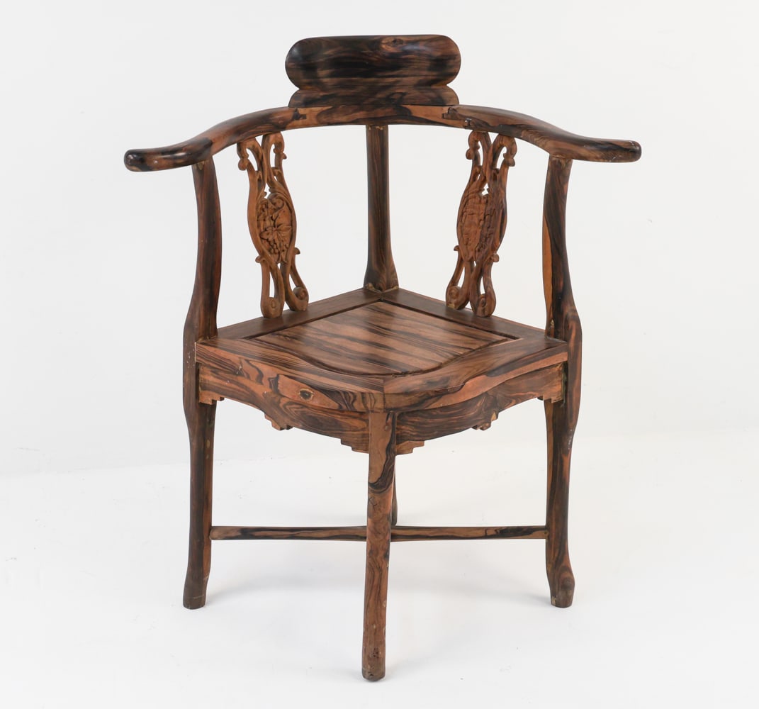ANTIQUE CHINESE ROSEWOOD CORNER CHAIR: Circa 1900's. Carved designed back slats. X Stretcher bar. Dimensions: H 31.5" x W 27" x D 20" SH 16.5" Condition: Slight separation to joints. Minor scuffs and stretches on arm rests and seat. Wear c