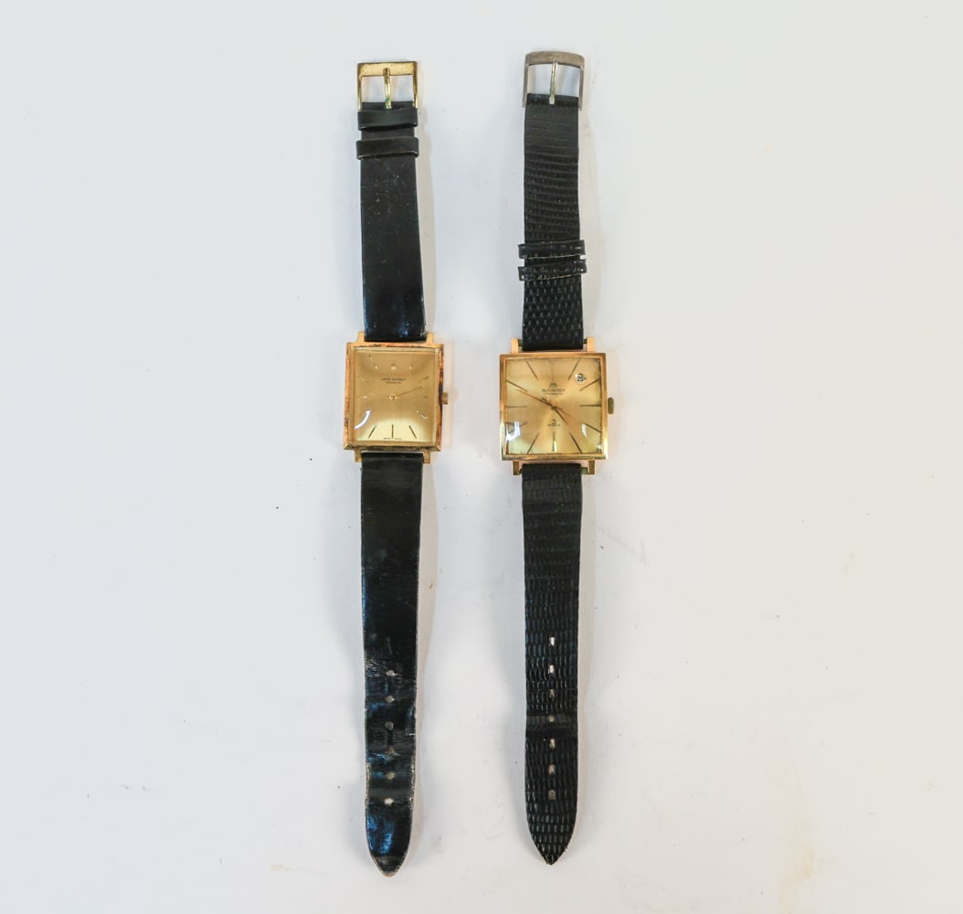 JEAN PERRET & BUCHERER WRISTWATCHES: 2 in total. Jean Perret Geneve gold plate watch marked 570 to the backside. Other marked Bucherer chronometer, 25 Jewel. Both with black leather wrist bands. Dimensions: (Longest watch) L 8.5" Conditi