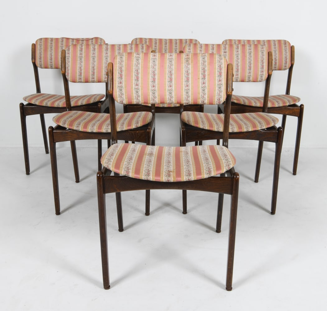 (6) ERIK BUCH NO.49 DANISH OAK DINING CHAIRS: For Oddense Mobelfabrik. Denmark, circa 1970's. Dimensions: H 32" x W 19" x D 17.25" x SH 17.25". Condition: Scuffs, scratches, and rubs to wood,. Loose trim on some seats. Some fading to fabric. Wear