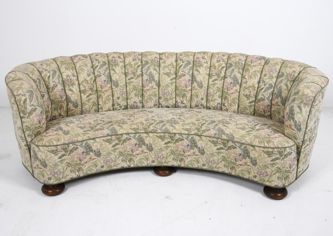 MID-CENTURY DANSIH BANANA SOFA C. 1960'S: Oak legs. Dimensions: H 28.5" x W 83" x D 39" x SH 14.5". Condition: Few scuffs and scratches to legs. Wear consistent with age and use. DMM085
